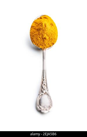 Indian turmeric powder. Turmeric spice. Ground turmeric isolated on white background. Stock Photo