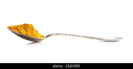 Indian turmeric powder. Turmeric spice. Ground turmeric isolated on white background. Stock Photo
