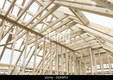 A residential house gets the roof converted to double the size of the house giving the owners more space. Stock Photo