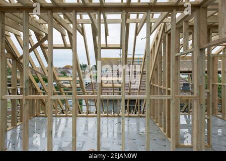 A residential house gets the roof converted to double the size of the house giving the owners more space. Stock Photo