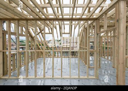 A residential house gets the roof converted to double the size of the house giving the owners more space. Stock Photo