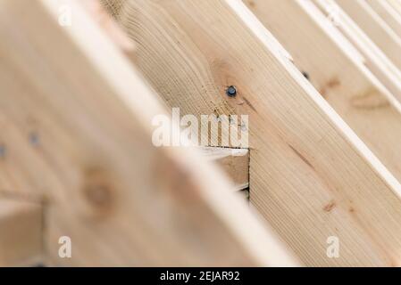 A residential house gets the roof converted to double the size of the house giving the owners more space. Stock Photo