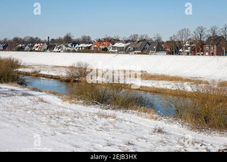 Dorsten, North Rhine-Westphalia, Germany - Sunny winter landscape in Ruhr area, ice and snow on the river Lippe. Stock Photo