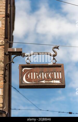 A old sign for a tobacconists shop on a wall in Bologna Italy Stock Photo