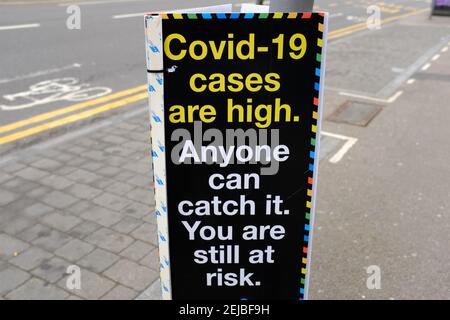 LEYTONSTONE, LONDON - 22ND FEBRUARY 2021: Public safety announcement for Covid-19 cases on Leytonstone High Road in East London. Stock Photo