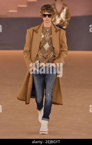 A model walks the runway at the Balmain Homme show during Paris Men's  Fashion Week Fall-Winter 2016/17 on January 23, 2016 in Paris, France.  Photo by Aurore Marechal/ABACAPRESS.COM Stock Photo - Alamy