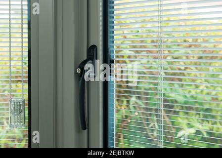 Details of modern double glazed windows with and without handles Stock Photo