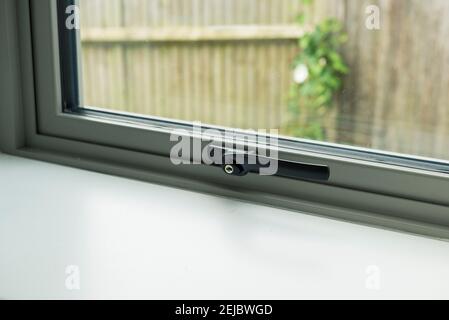 Details of modern double glazed windows with and without handles Stock Photo