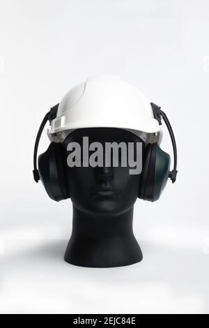 Safety helmet and ear defenders. Stock Photo