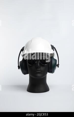 Mannequin with safety hat and safety sunglasses. Stock Photo