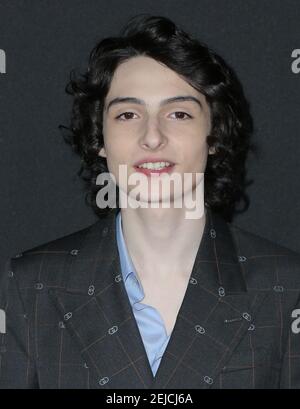 Finn Wolfhard walking the red carpet at the Premiere of Universal ...