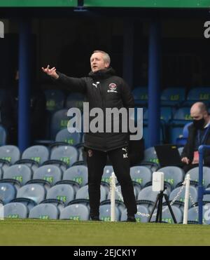 Blackpool head coach Neil Critchley during the Sky Bet League One match between Portsmouth and Blackpool Town at Fratton Park  , Portsmouth ,  UK - 20th February 2021.  Editorial use only. No merchandising. For Football images FA and Premier League restrictions apply inc. no internet/mobile usage without FAPL license - for details contact Football Dataco  : Stock Photo