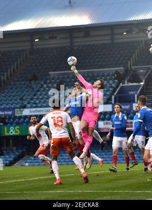 Goalkeeper Chris Maxwell of Blackpool punches the ball clear during the Sky Bet League One match between Portsmouth and Blackpool Town at Fratton Park  , Portsmouth ,  UK - 20th February 2021 Editorial use only. No merchandising. For Football images FA and Premier League restrictions apply inc. no internet/mobile usage without FAPL license - for details contact Football Dataco  : Stock Photo