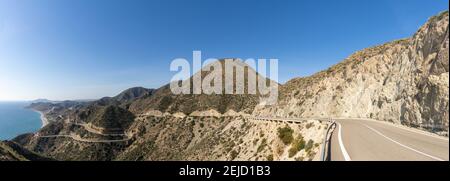 Panorama view of a scenic winding mountain road on the Costa de Almeria in southern Spain Stock Photo