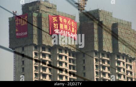 apartment buildings under construction in shanghai, china, 2005 Stock Photo