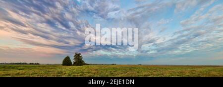 Clouds over landscape at sunrise, Prairie Ridge State Natural Area, Marion County, Illinois, USA Stock Photo