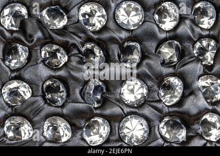 Diamond decoration stones on black background. Stock Photo
