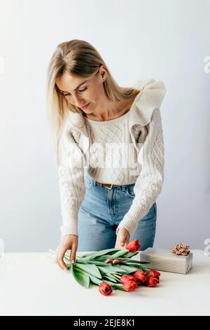 florist woman making a bouquet Stock Photo