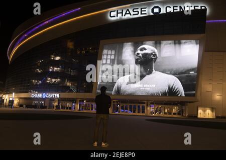 People gather quietly in front of a large image of former Los Angeles basketball player Kobe Bryant at Chase Center in San Francisco, California, United States on January 27, 2020 to pay tribute the legendary sportsman. The world famous NBA player was killed in a helicopter accident on January 26, 2020 when his private Sikorsky S-76B helicopter crashed into a mountain in Calasabas, California and killed 9 people, including his daughter Gigi Bryant. (Photo by Yichuan Cao/Sipa USA)