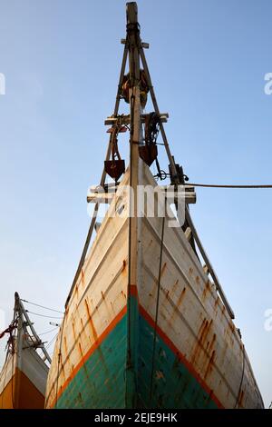 Pinisi (sometimes spelled Phinisi) are a type of two-masted schooner built by the Bugis of South Sulawesi. Most of them are motorised now and a mast h Stock Photo