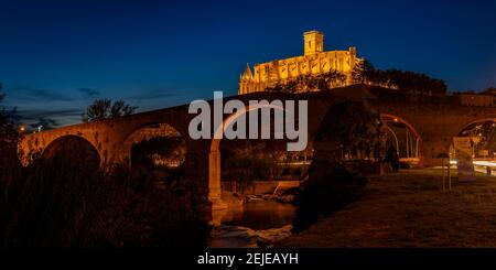 Manresa during the blue hour at night. La Seu de Manresa cathedral with night lighting (Barcelona, Catalonia, Spain) Stock Photo