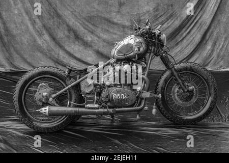 Custom bobber motorbike standing on a road. — Stock Photo © Stramyk  #418323040