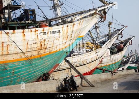 Pinisi (sometimes spelled Phinisi) are a type of two-masted schooner built by the Bugis of South Sulawesi. Most of them are motorised now and a mast h Stock Photo