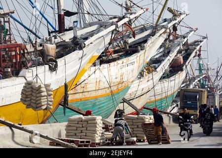 Pinisi (sometimes spelled Phinisi) are a type of two-masted schooner built by the Bugis of South Sulawesi. Most of them are motorised now and a mast h Stock Photo