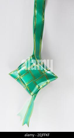 The beutiful green and gold line colors ribbon of ketupat raya Stock Photo