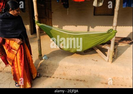 BANGLADESH, Region Madhupur, Garo people, matrilineal society, infant in cradle, sleeping baby  / BANGLADESCH, Madhupur, Garos sind eine christliche u. ethnische Minderheit , Garo folgen einer matrilinearen Abstammungsregel, Kind in Wiege Stock Photo