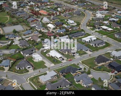 Aerial view of houses in a city, Wanaka, Queenstown-Lakes District, Otago, South Island, New Zealand