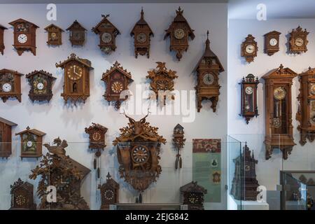 Display of cuckoo clocks in German Clock Museum, Furtwangen Im Schwarzwald, Black Forest, Baden-Wurttemberg, Germany Stock Photo