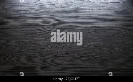 dark wooden plank , deep texture with light. background Stock Photo