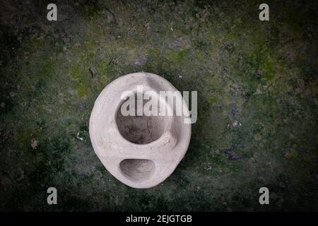 This is a handmade Bangladeshi clay stove. It is used for cooking in rural Bengal. Stock Photo