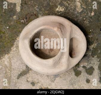 This is a handmade Bangladeshi clay stove. It is used for cooking in rural Bengal. The image highlights the heritage of the village. Stock Photo