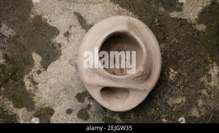 This is a handmade Bangladeshi clay stove. It is used for cooking in rural Bengal. Stock Photo