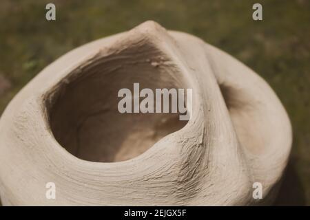 This is a handmade Bangladeshi clay stove. It is used for cooking in rural Bengal. The image highlights the heritage of the village. Stock Photo