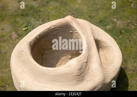 This is a handmade Bangladeshi clay stove. It is used for cooking in rural Bengal. The image highlights the heritage of the village. Stock Photo