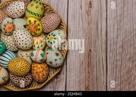 Colorful Easter Egg banner.Above view with copy space.Happy Easter decoration background,colorful hand painted decorated eggs.Festive tradition Stock Photo