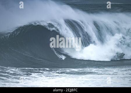 Surfer Kai Lenny Hawaii Is Seen Riding A Wave During The Nazare Tow Surfing Challenge Held At Praia Do Norte Beach In Nazare Nazare Tow Surfing Challenge Is A World Surf League Big Surfer Kai Lenny Hawaii Is Seen Riding A Wave During The Nazare Tow Surfing Challenge Held At Praia Do Norte Beach In Nazare Nazare Tow Surfing Challenge Is A World Surf League Big