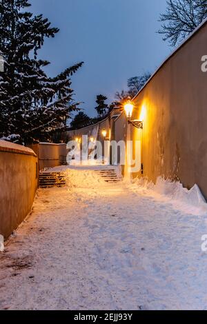 Old Castle Stairs at night, Prague, Czech Republic.Beautiful spectacular winter panorama of Vltava river and historical buildings.Romantic way up Stock Photo