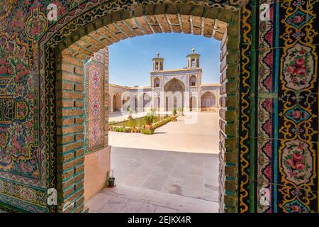 Shiraz, Iran-04.17.2019: Courtyard of the Pink Mosque, Nasir al-Mulk, with no people. Beautiful mosque built by Qajar dynasty. Stock Photo