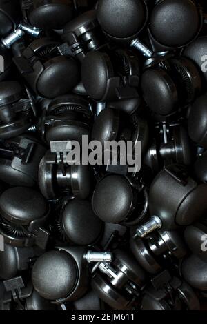 Black plastic wheel roller unit component Stock Photo
