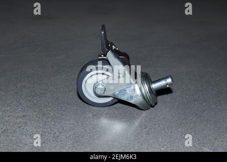 Industrial heavy weight wheel with break unit on concrete Stock Photo