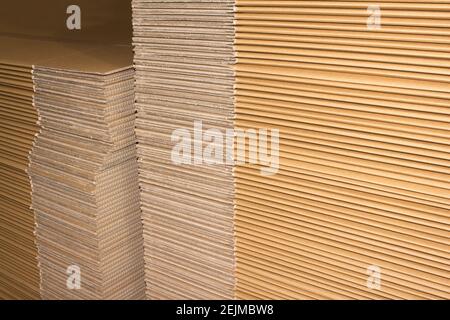 Stack of flat industrial folding cardboard packaging boxes Stock Photo