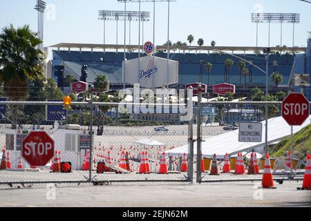 Closed and locked gates at the Dodger Stadium COVID-19 Vaccination Site, Monday, Feb. 22, 2021, in Los Angeles. Stock Photo