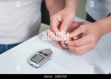 closeup of tool for measuring blood glucose levels Stock Photo