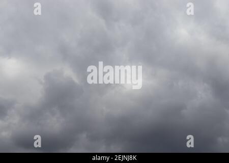 beautiful bright white and gray clouds on a blue sky, gray cloudy sky, beautiful fluffy gray clouds, cloudy day Stock Photo