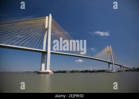 Wide angle view of the Tsubasa - Neak Loeung Bridge spanning the Mekong river in Phnom Penh Cambodia Asia Stock Photo