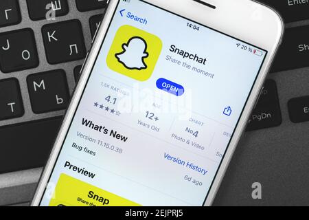 Kharkov, Ukraine - February 22, 2021: Snapchat application, app logo on Apple smartphone screen in App store, photo Stock Photo